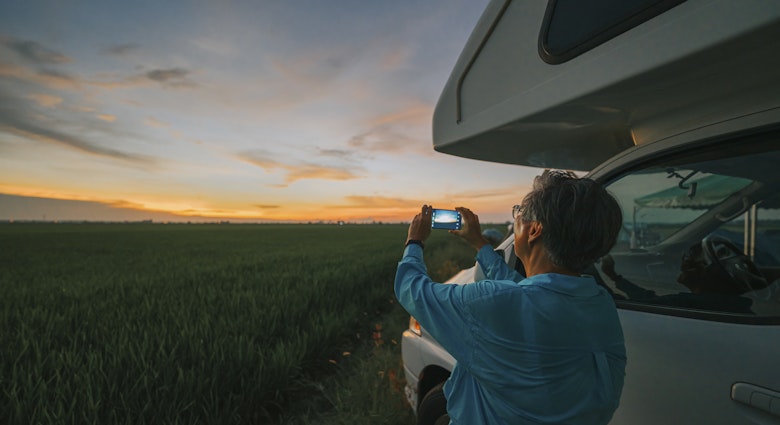 Asian chinese senior woman photographing sunset at paddy field with smart phone beside campervan motor home
1397145769
© Edwin Tan / Getty Images